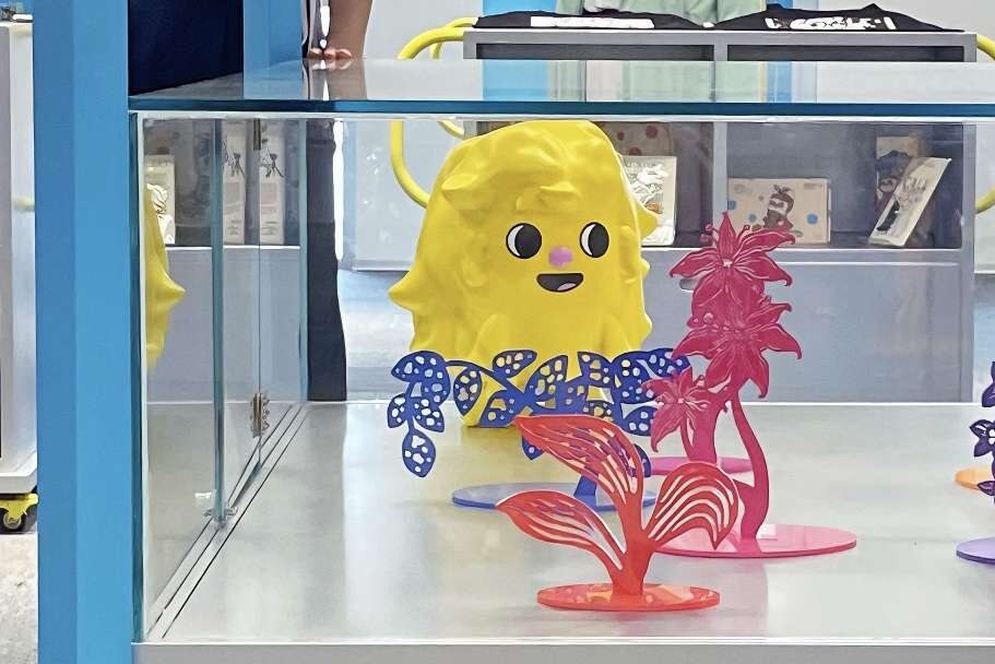 Character graphic installed inside a glass display